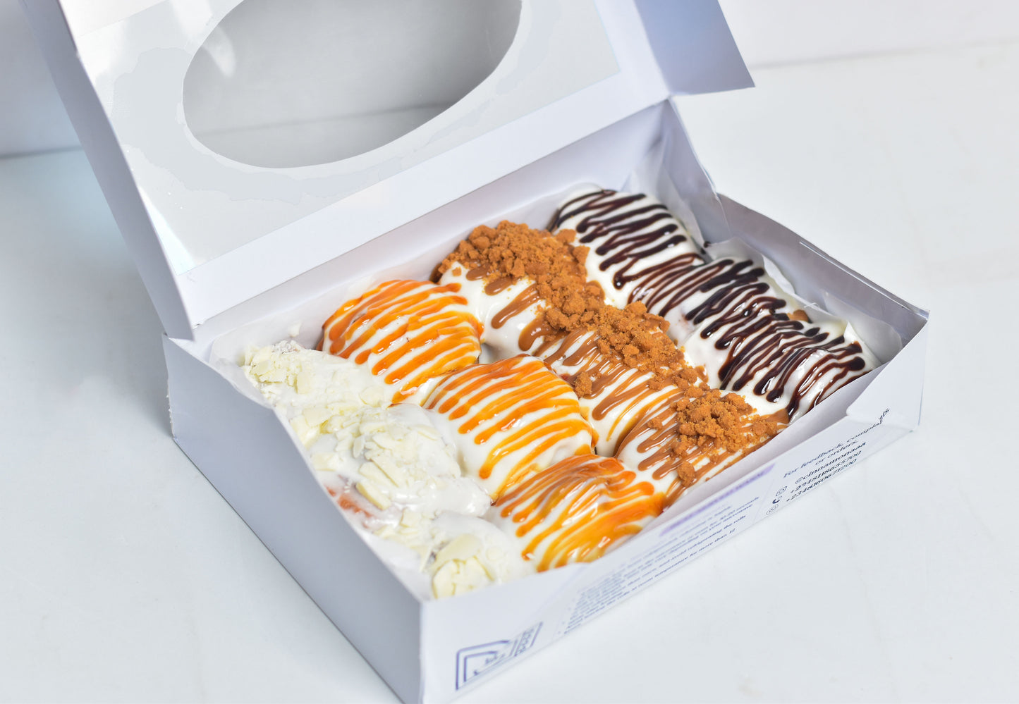 Frosted Cinnamon Rolls with Toppings