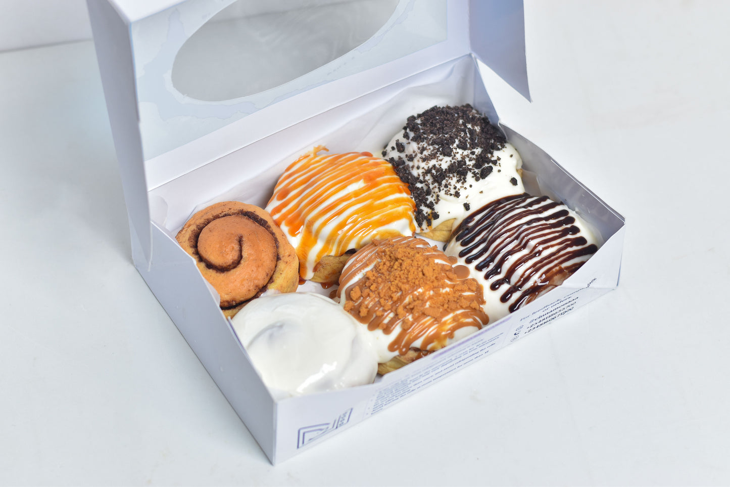 Frosted Cinnamon Rolls with Toppings